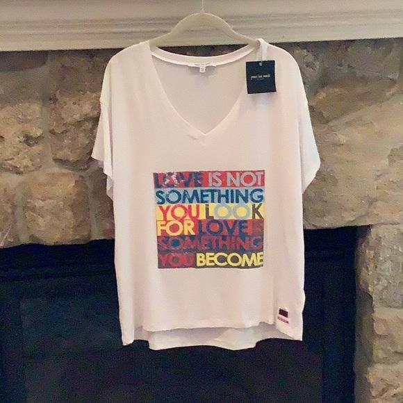 Peace Love World tee. Size S. V neckline